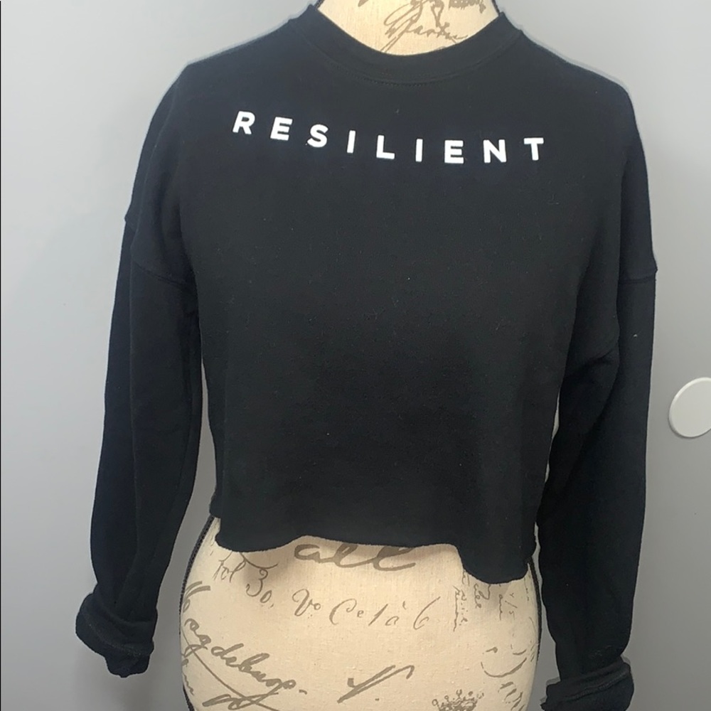 Reselling black cropped crew neck sweater